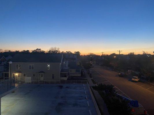 Sunset from one of the front windows in unit 212