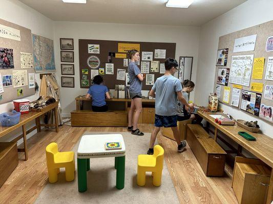 Kids space with old fashioned typewriter and cash register.