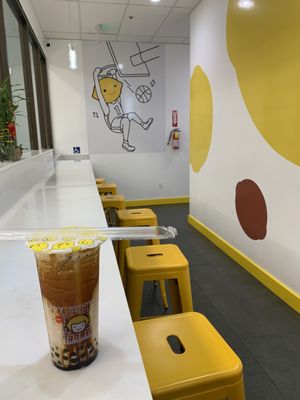 Okinawa boba milk tea, and the interior of Happy Lemon