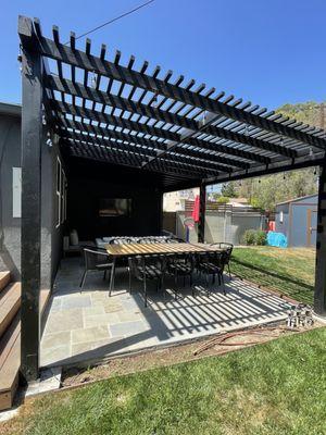 Outdoor living space with fully covered and partial covered pergola