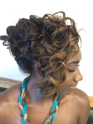 Thermal texturized (natural) hair with highlights.