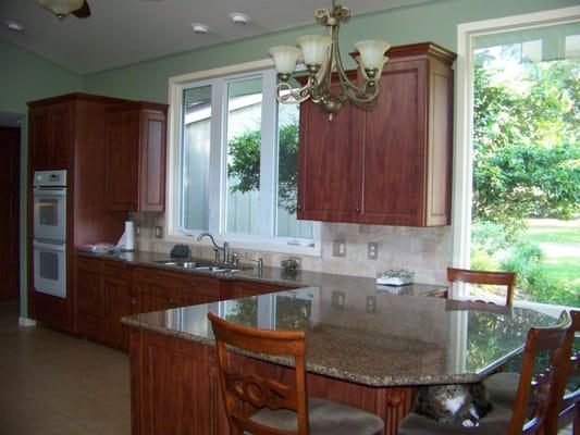 Raised panel wood cabinets w/Granite countertops