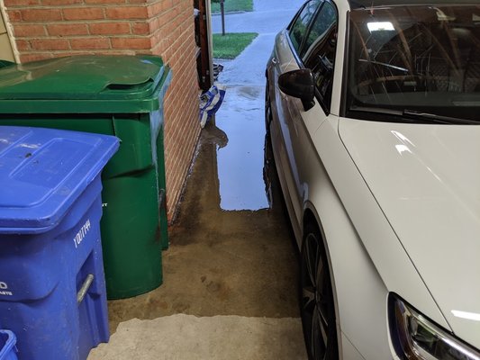 Before - water making its way to the opposite side connected to the house.