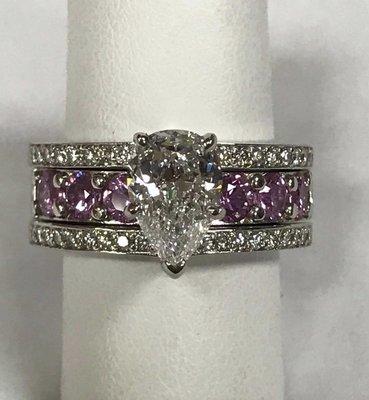 Interchangeable center band on this wedding set. Custom made by TJC