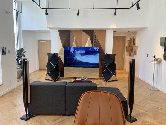 Premium surround sound system. 77" BeoVision Harmony with BeoLab 90 loudspeakers and wireless BeoLab 18's in the rear.