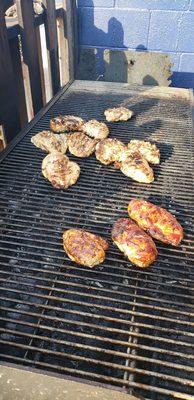 Grilling up chicken for sandwiches.