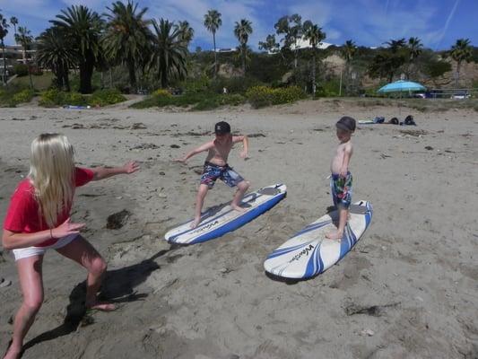 Now the surfing students practice their "Pop-Ups" a few times before gettin their wetsuits on!