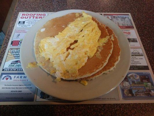 This was how I was served my eggs and pancakes. Where do I put the syrup!? ...Maybe they were trying to conserve plates?