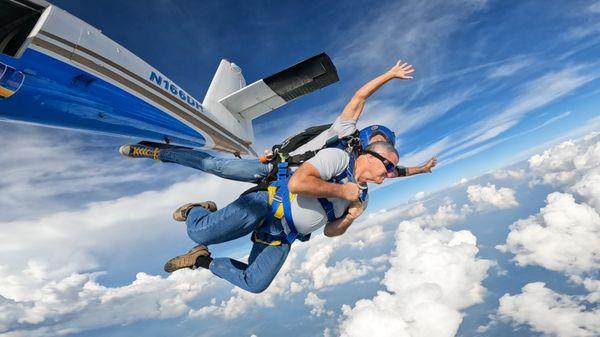 My hubby and Ronnie - his instructor - Right after the jumped out of the plane! Beautiful shot! Credit to photographer!