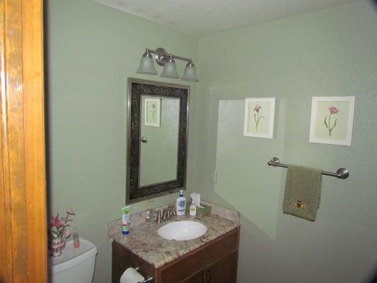 Small bath remodel.  New vanity, light, mirror, toilet, towel bars, etc.