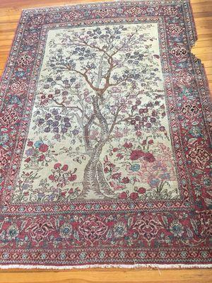 Antique Persian tree of life before repairs and cleaning