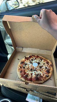 The horrible so called large thin crust pizza that I received