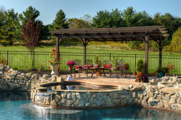 We installed this pergola over patio alongside hot tub and swimming pool we designed and built!