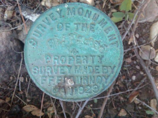 This is an old survey monument set back in 1929 by Frank F. Flournoy, a very prolific land surveyor in Santa Barbara then