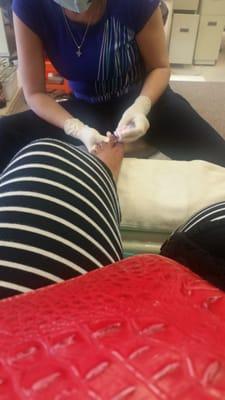 The pedi process!! This lady is amazing,she works wonders with my feet each ans every time!