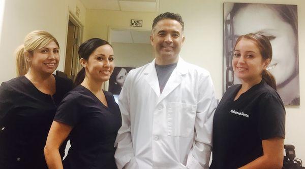 Dr. Castro and the Smileneeds staff