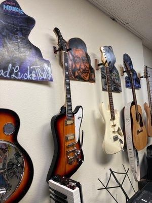 Cool decorations on the wall of his studio.