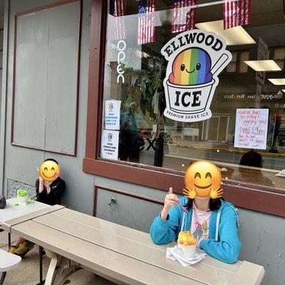 Enjoying our shave ice outside the lil' shop. Love their cute logo!