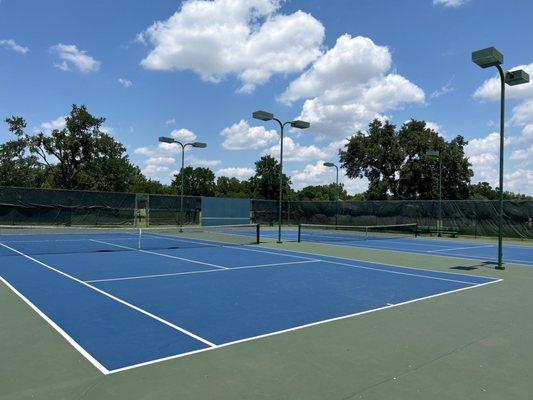 Well designed tennis courts with lighting