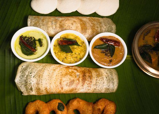 Dosa, Idli and Vada with sambar and chutneys..