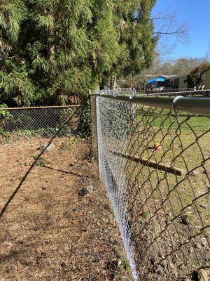 Did not secure top of entire fencing panel. Bows out