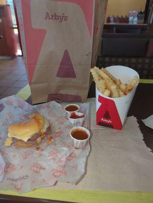 Roasted slider large wrinkle fries and gotta have the three pepper sauce.