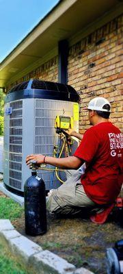 Installation team member Allen working hard on this 20 SEER Installation American Standard