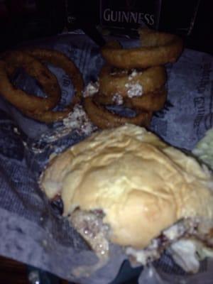 Sorry for the quality of the photo but the Blue cheese burger and onion rings is quite good although messy .. }}