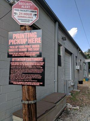 This is where you are supposed to pick up your order. In a trash bin behind a warehouse.