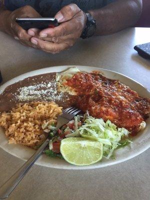 Huevos Rancheros.. beans and rice... pretty good and came with home made tortillas