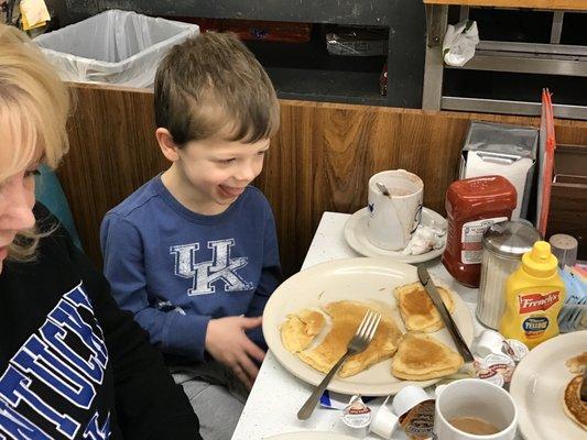 Sweet Zac (RIP) loving his 'Mickey Mouse' pancakes, made with love at Wheeler's