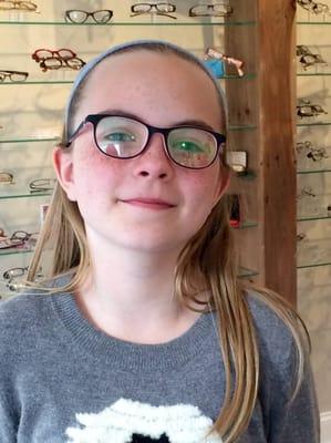 Sophie is excited with her new glasses and absolutely loved her exam!