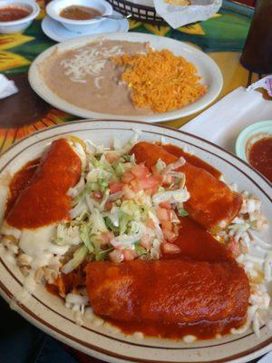 Enchilada's Acapulco - Shrimp and crab stuffed enchilada's. Served with rice and beans.