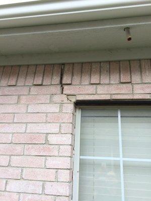 Brick separation above a window.