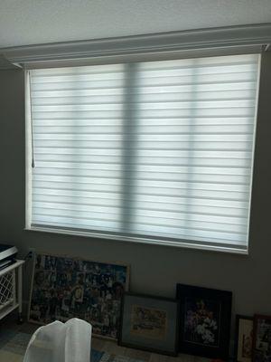 Banded Roller shade with motorized wand.