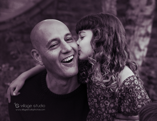 Family photography taken at our Verona Park location. She loves her daddy!