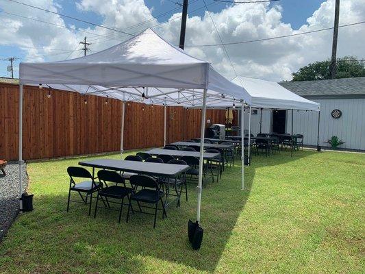 Awesome looking setup this past weekend for a celebration of life with our chairs, tables, tents and string lighting!