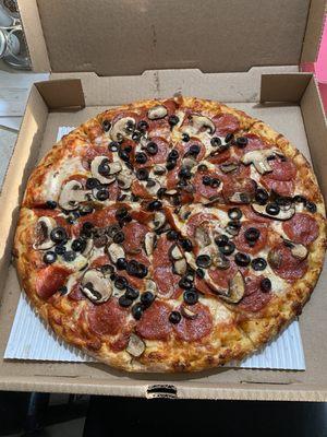 Large pepperoni, mushroom, olives, well done