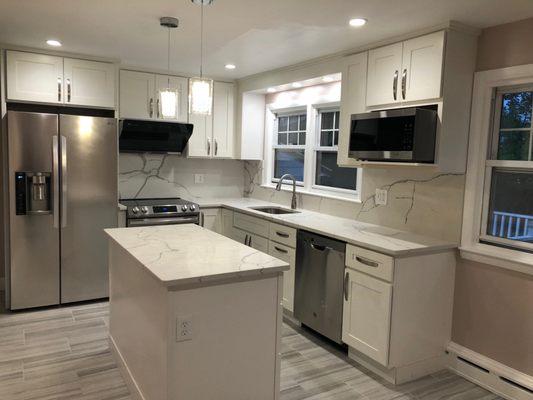 Extremely happy with the layout, quality of the cabinets, countertop and island!