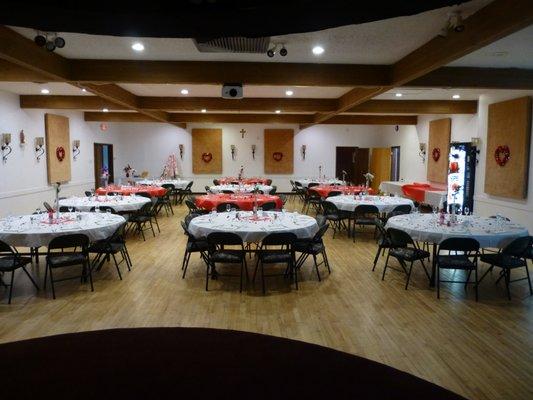 Valentine's Day Party Setup taken from the Stage. Round Table Setup has Room for 150 to 200 People.