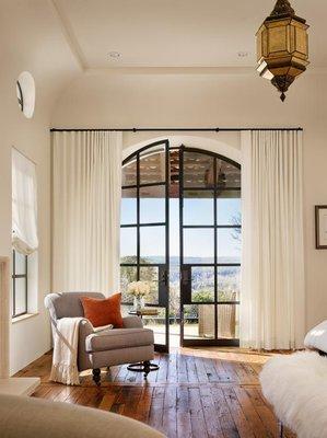 White drapes with black H-rail