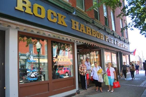 Tour guests outside of Rock Harbor Brewing