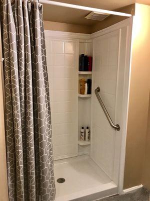 Shower  room with stock shampoo and conditioner