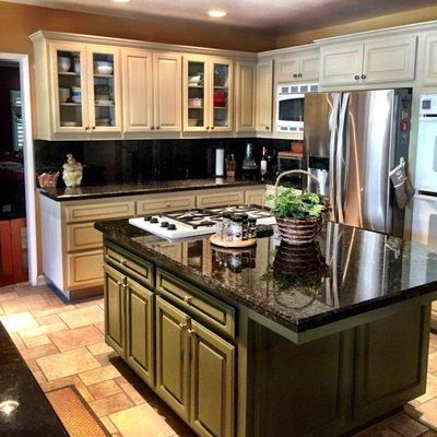 Painted this kitchen - made it current and beautiful.  Very affordable.