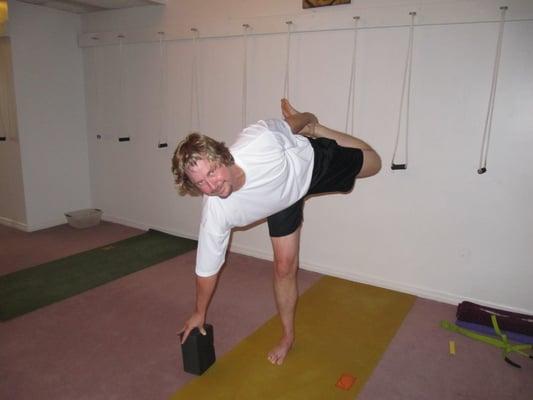 Bob, just as happy in Ardha Chandra Chopasana with the support of a block.  We have blocks, straps, blankets as props if needed~