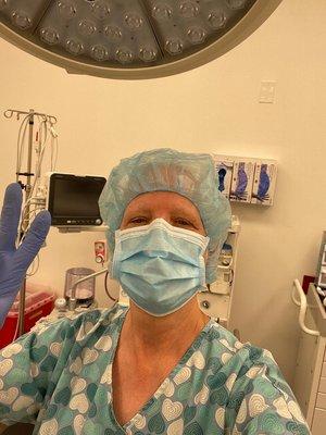 Nancy cleaning and sanitizing an operating room.