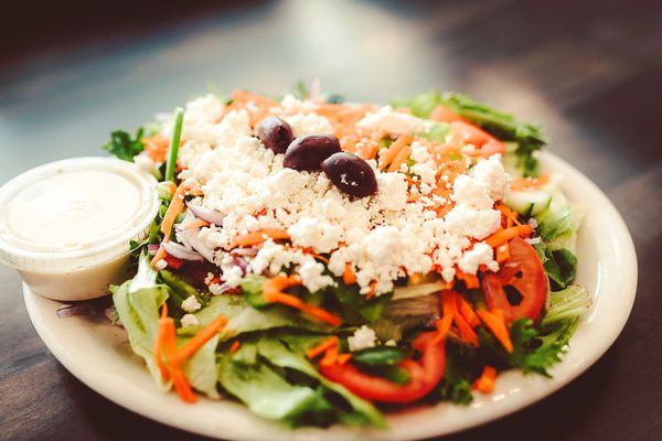 Greek salad. Available with souvlaki chicken, steak or as is.