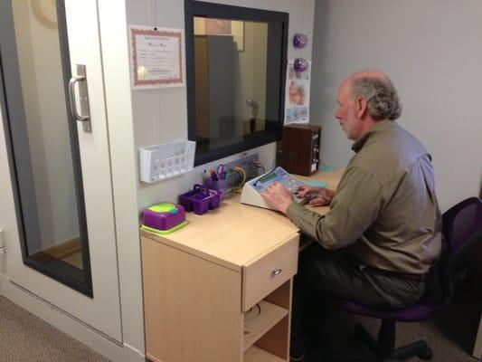 Tim Higgins performing a hearing test