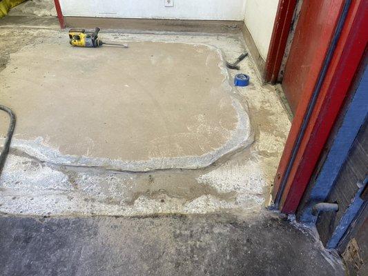 One inch mortar floor removal to bare concrete