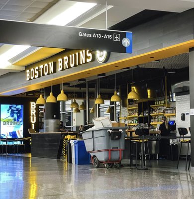 Boston Bruins Bar across from Gate A16.